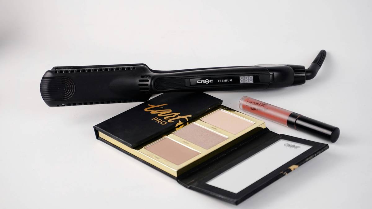 A close-up shot of different types of eyebrow brushes on a white background.