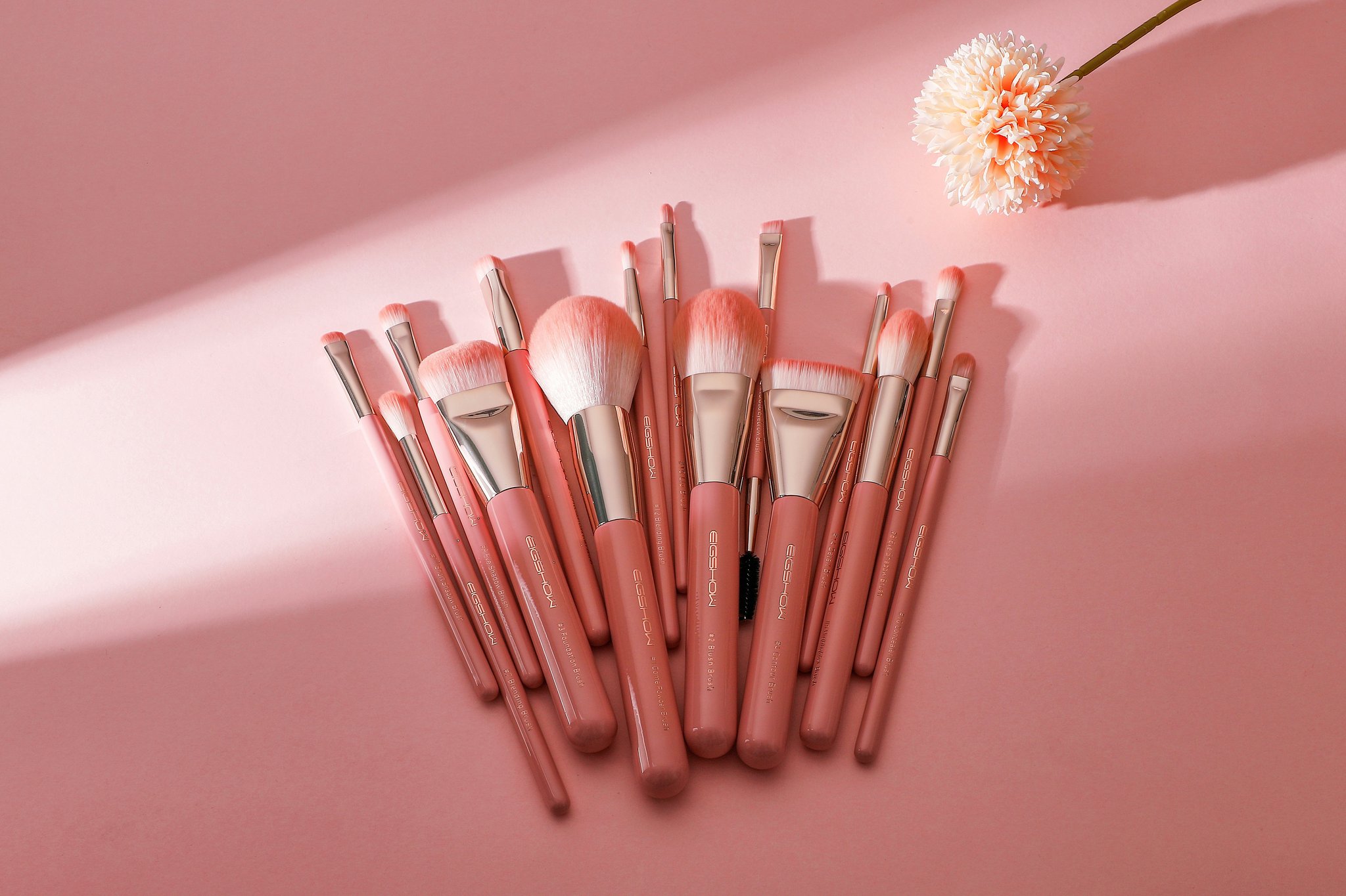 An illustration showing angled, spoolie, and dual-ended eyebrow brushes