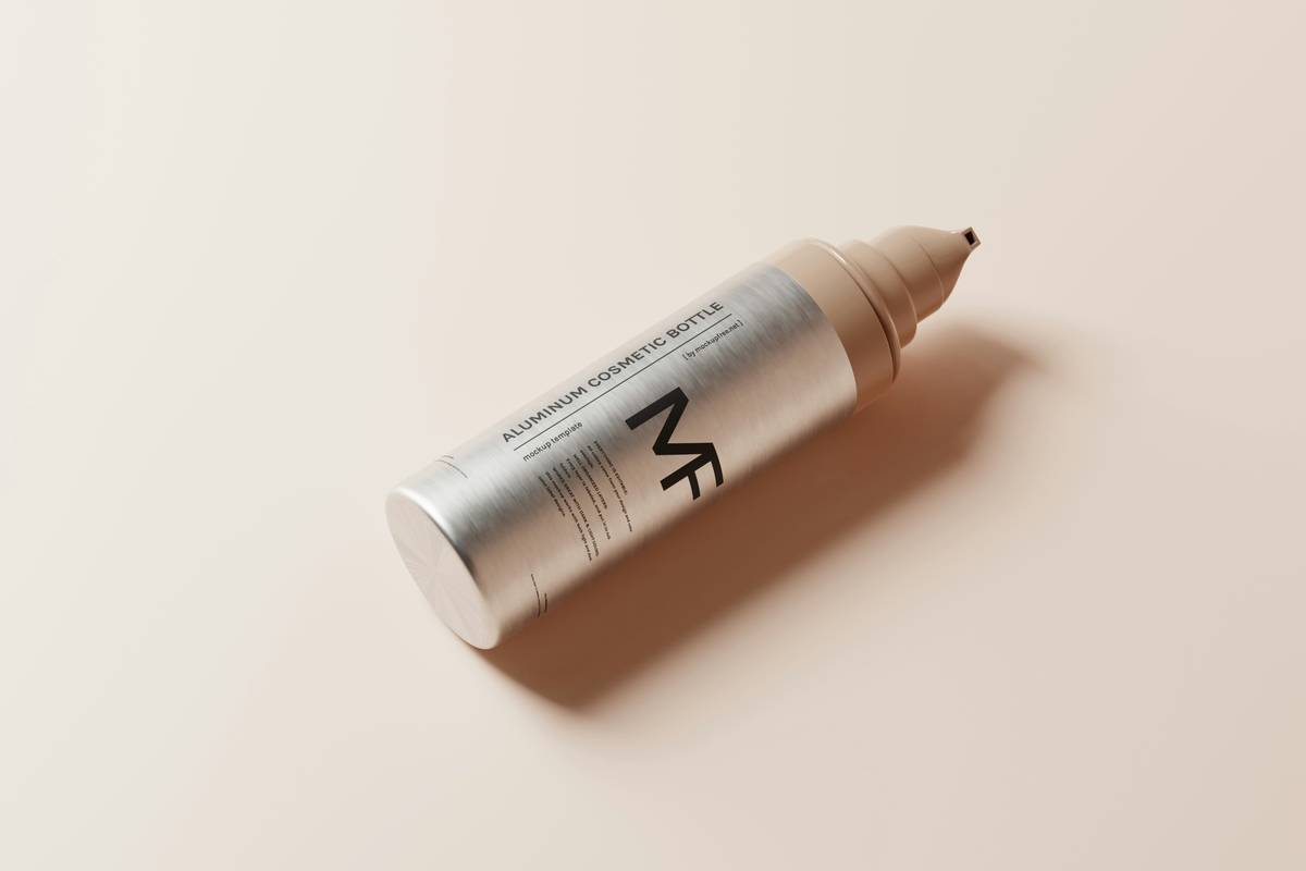 Close-up of various brow tint applicators and tints on a white surface