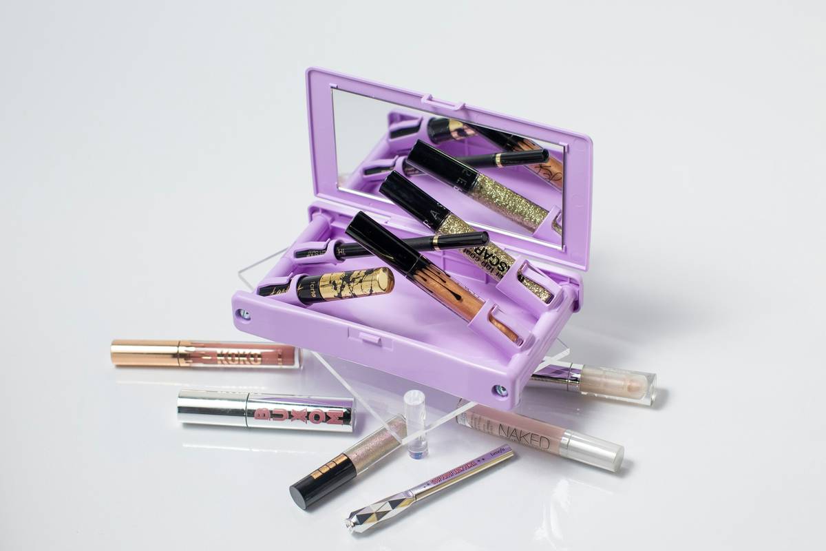 Different types of eyebrow brushes showing angled, spoolie, and dual-ended designs.