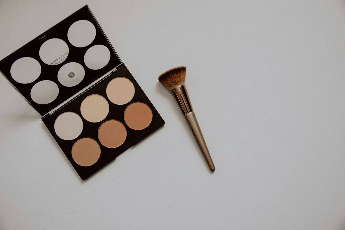 Step-by-step guide showing how to properly use an eyebrow comb for blending brow makeup.
