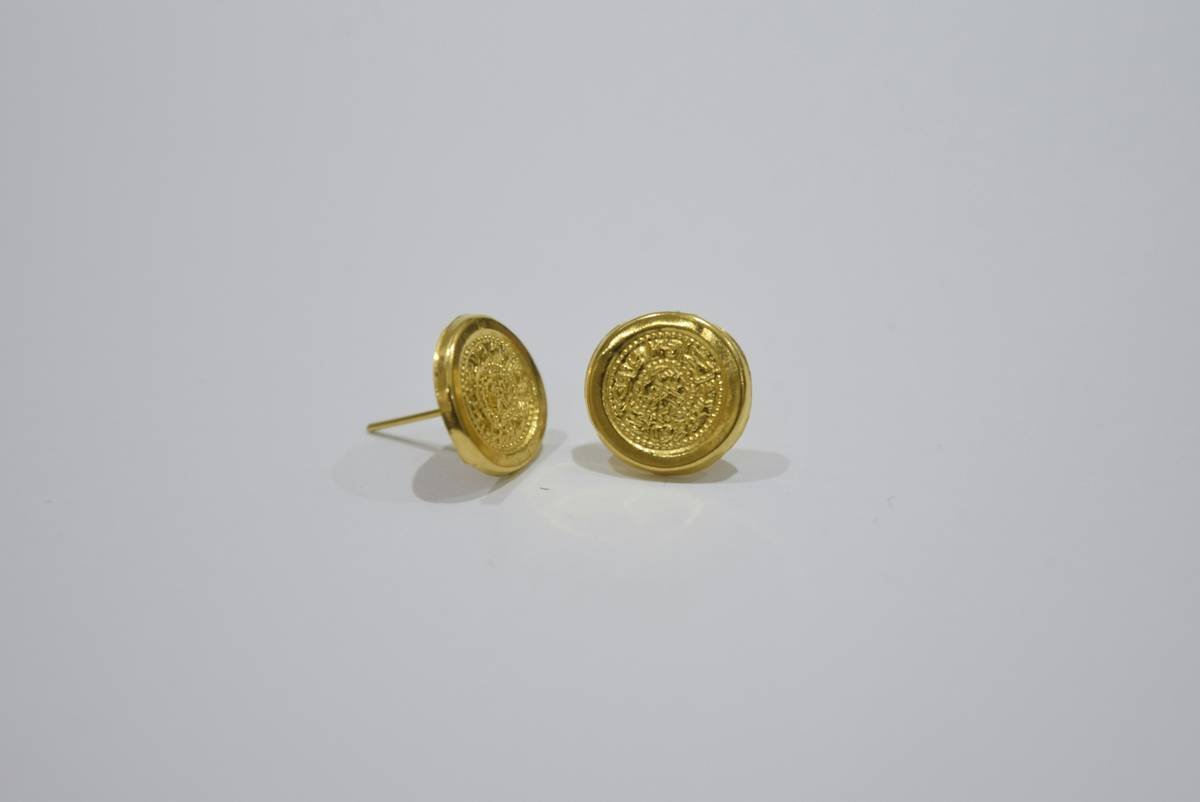 Closeup photo of various types of eyebrow brushes laid out on a table