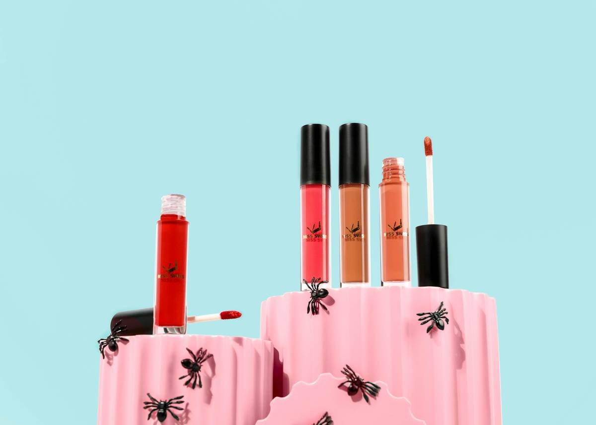 Close-up photo of a high-quality angled brow makeup brush against marble background